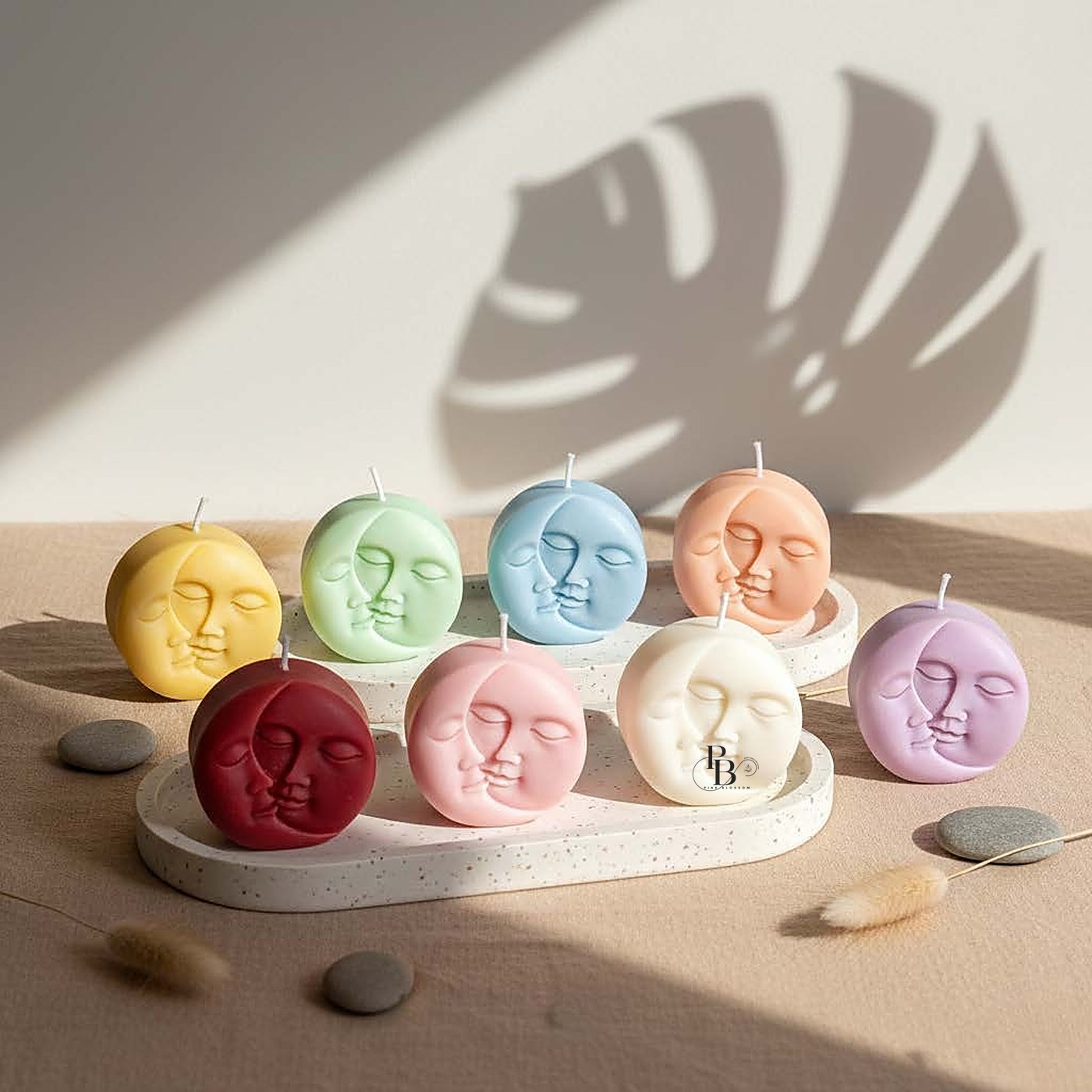 Round moon face candles displayed on a white tray, handmade soy wax, Pink Blossom bulk order