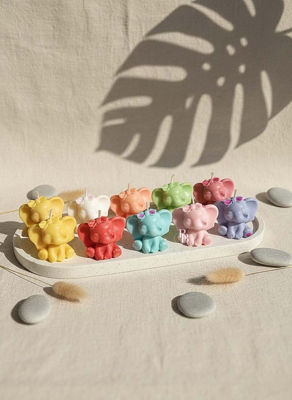 Colourful small animal candles arranged on an oval tray, handmade soy wax, Pink Blossom bulk order
