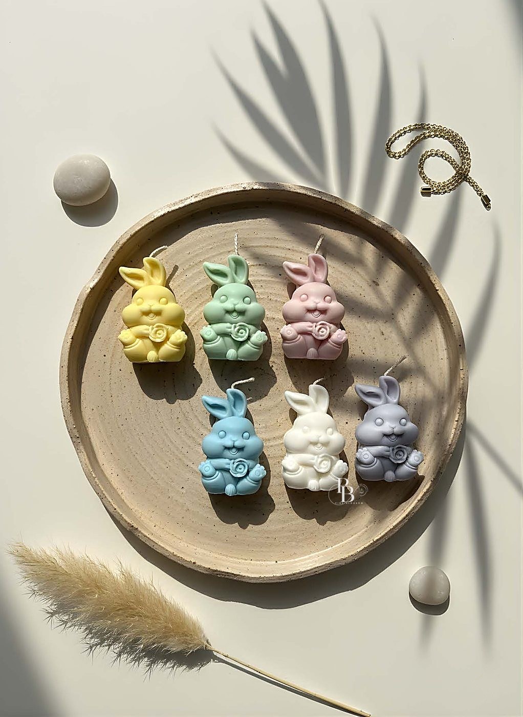 Pastel bunny candles arranged on a round wooden tray, handmade soy wax, Pink Blossom bulk order