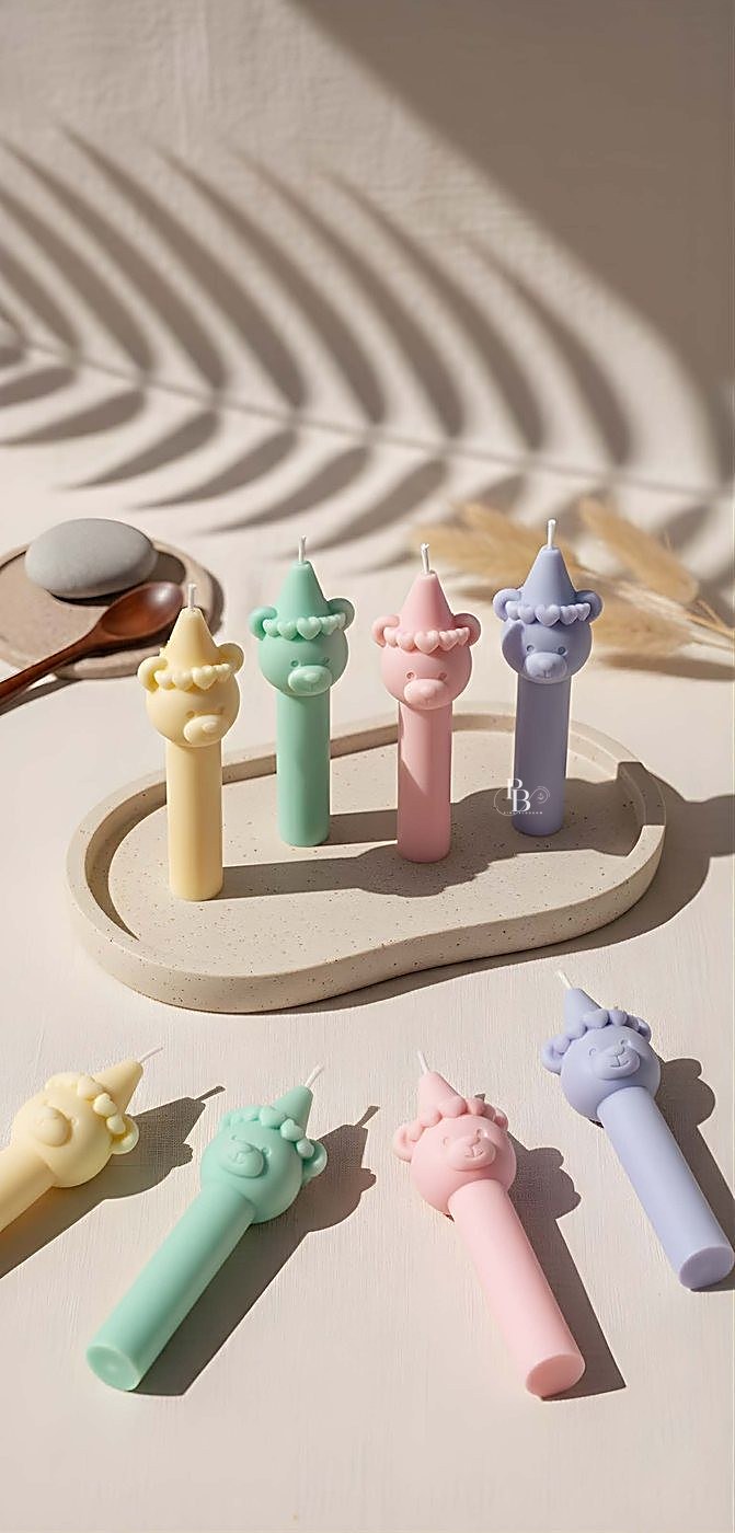 Slim pastel unicorn pillar candles on a tray and table, handmade soy wax, Pink Blossom bulk order