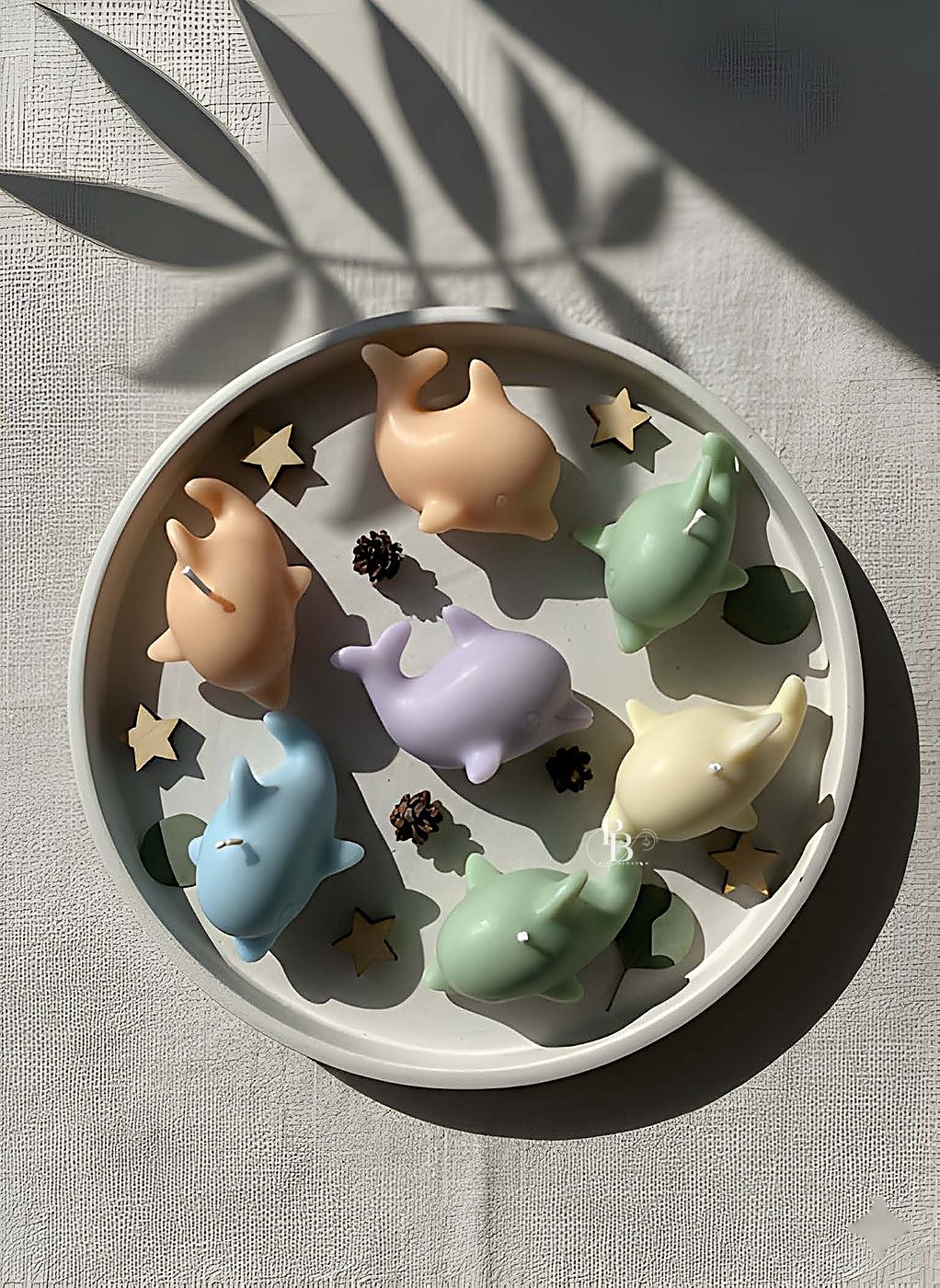 Pastel dolphin candles with stars in a round tray, handmade soy wax, Pink Blossom bulk order