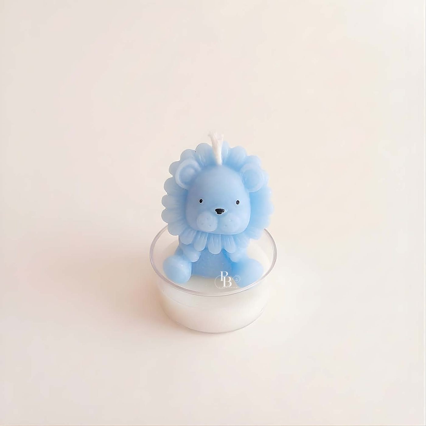 Blue lion cub candle in a small clear glass, handmade soy wax, Pink Blossom bulk order
