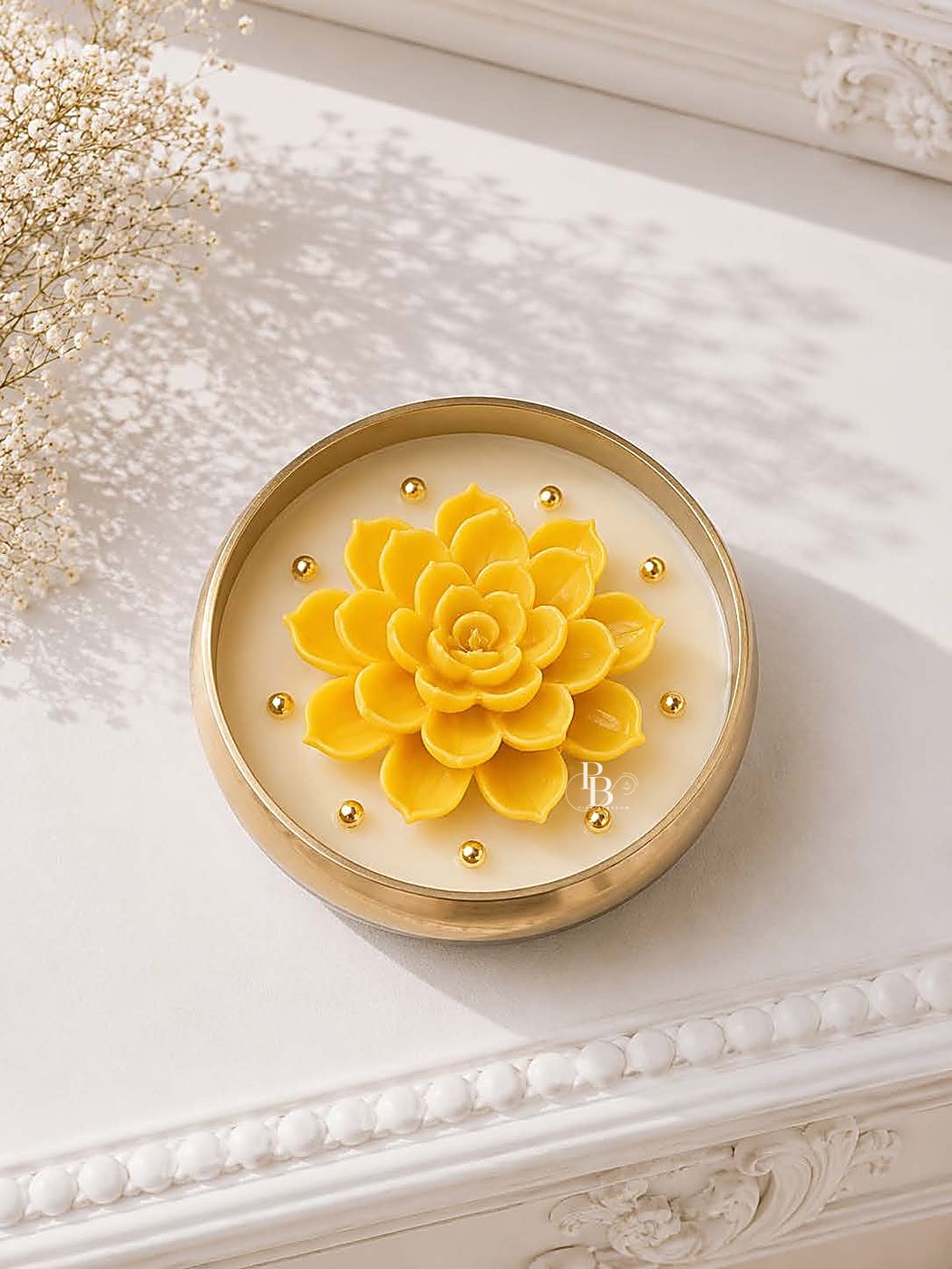 Round gold urli candle topped with a yellow succulent flower, 5 Inch Urli, handmade soy wax, Pink Blossom bulk order