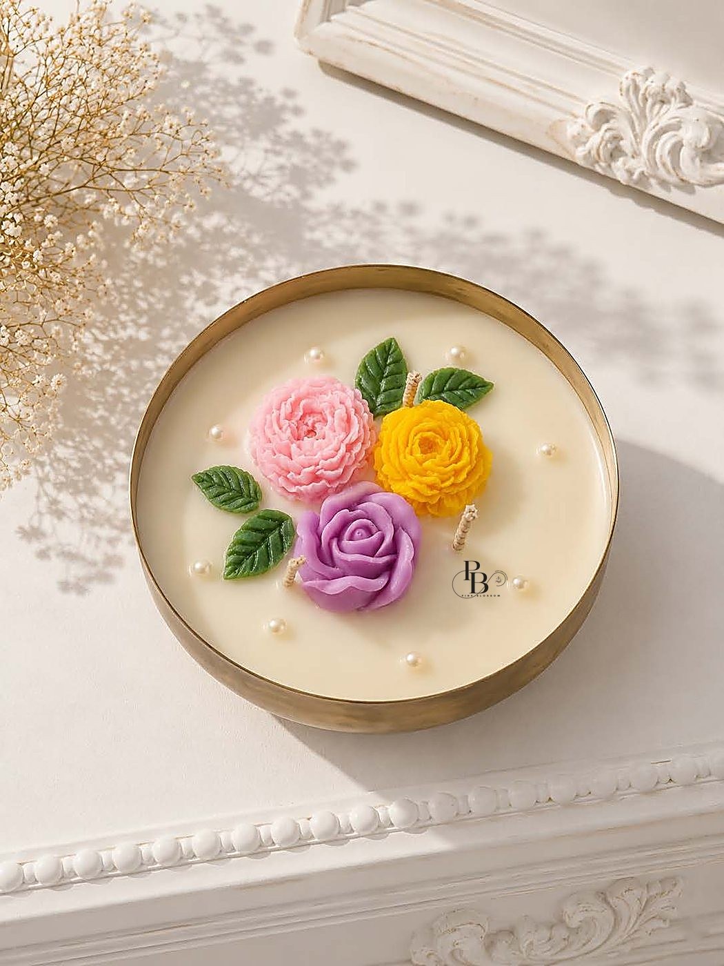 Round gold urli candle topped with three colourful roses, 4 Inch Urli, handmade soy wax, Pink Blossom bulk order